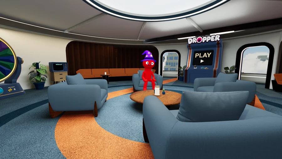 A red player in a purple wizard hat seated in the bright polished lobby.